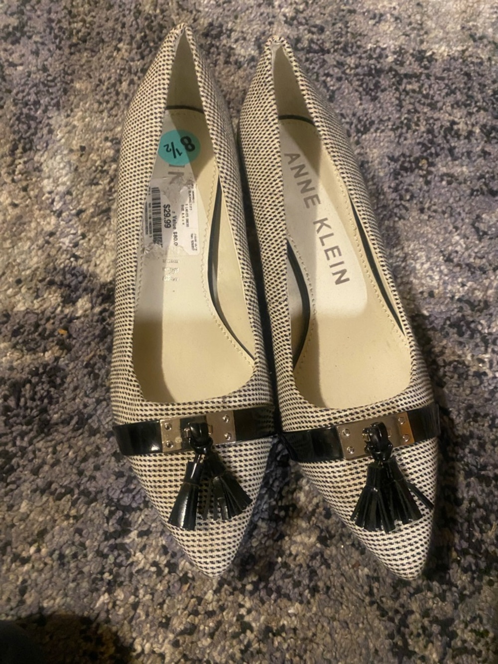 Anne Klein Black and White Pointed Toe Tassel Flats